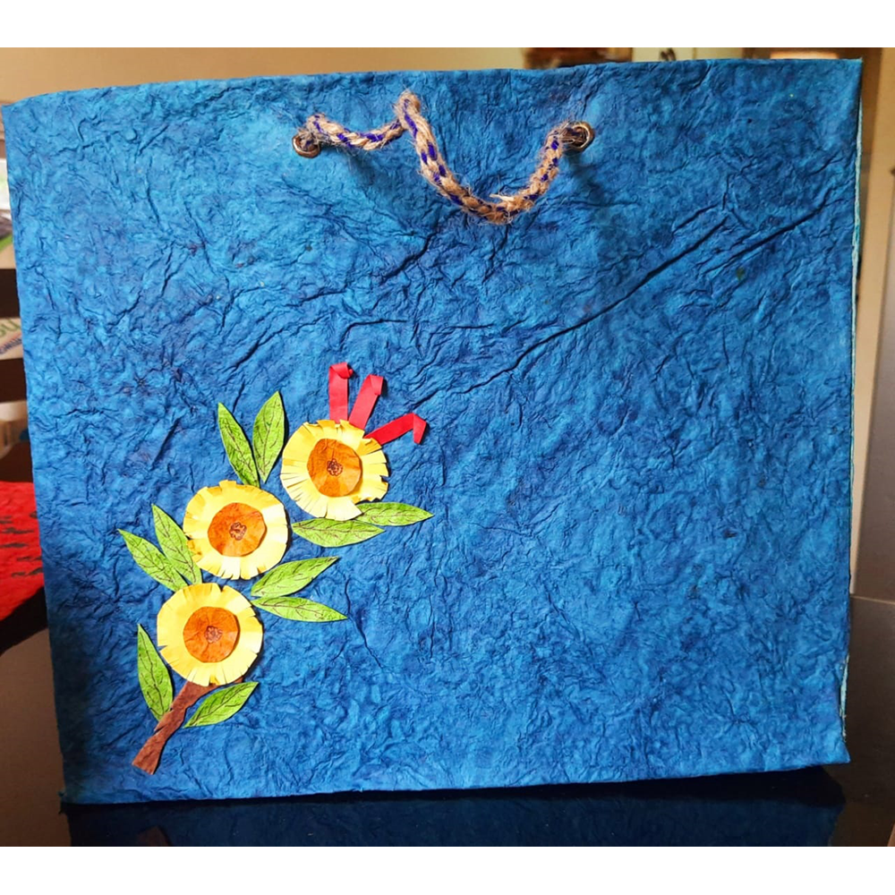 BLUE WITH FLOWERS PAPER BAG